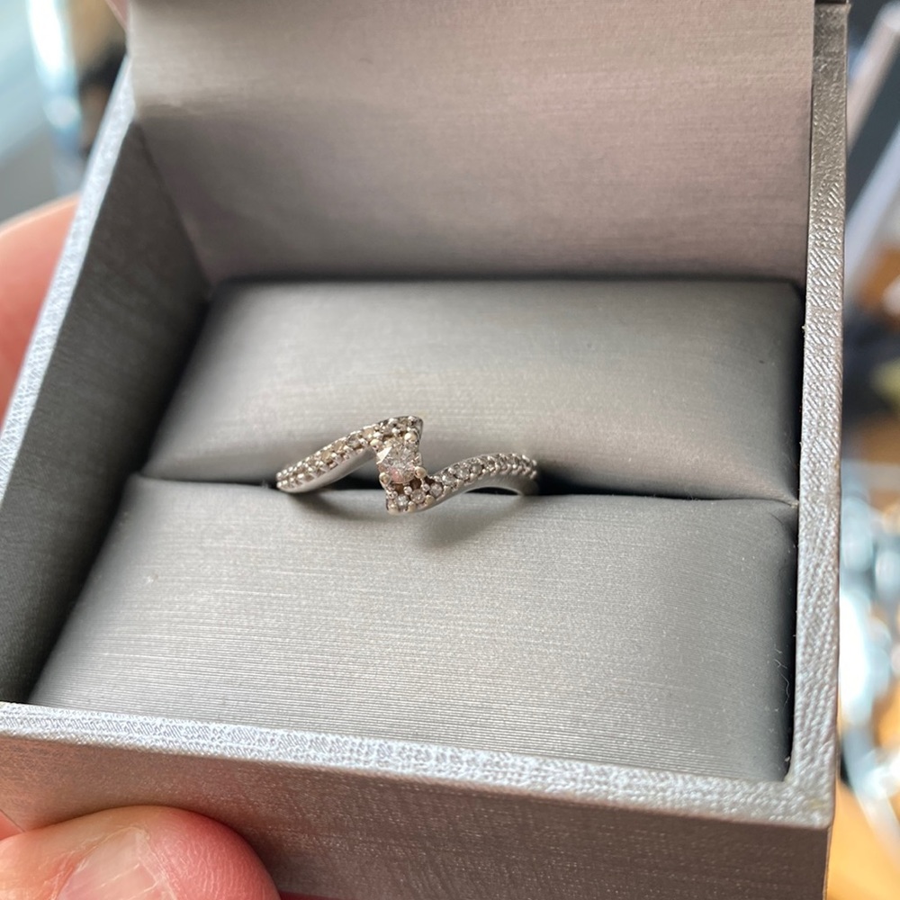 Diamond ring with side stones, white gold